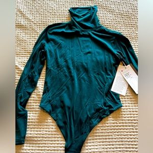 Lululemon Nulu thong bodysuit with long sleeves sz M